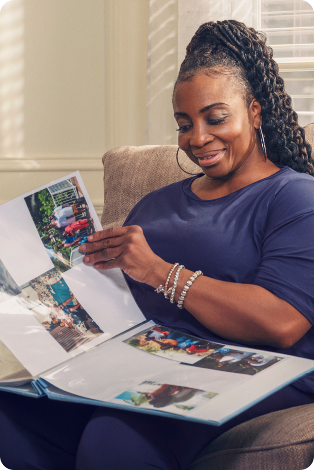 Sandy at home, surrounded by her travel mementos